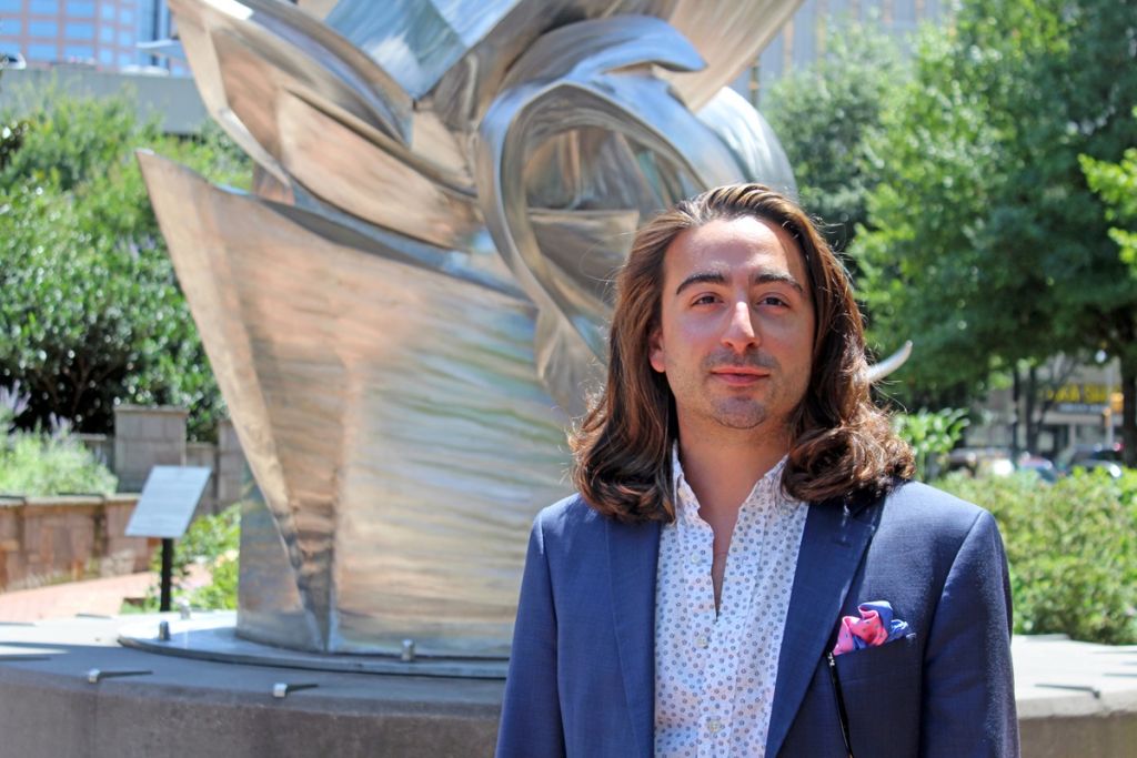 A headshot of Adam Santalla Pierce.