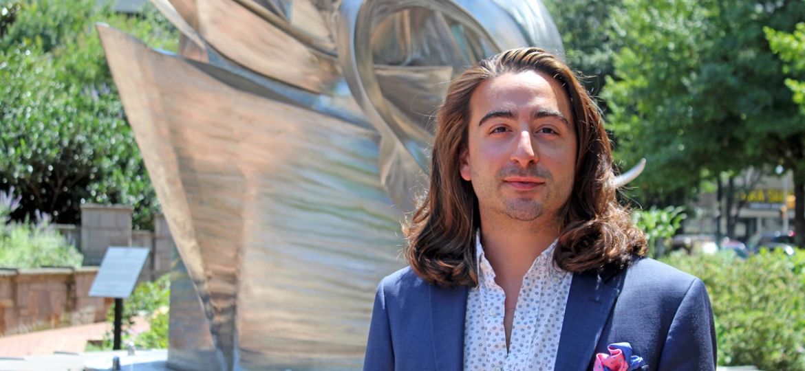 A headshot of Adam Santalla Pierce.